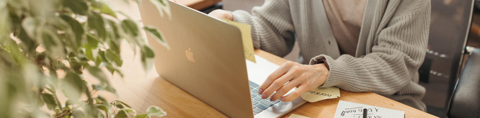 Woman sitting in front of a laptop computer